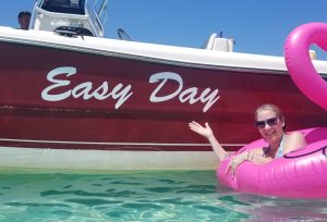 Boat and woman floating